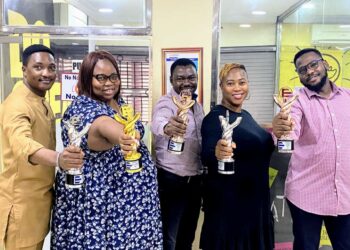 Humans of GDM Group Pose with their EXMAN Awards