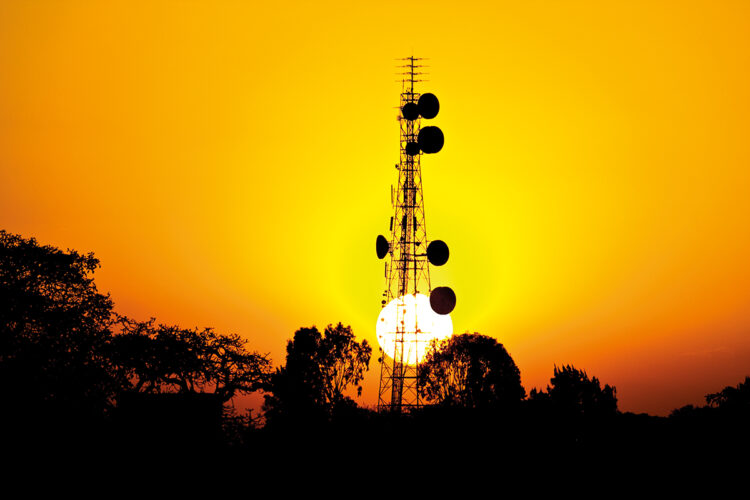 Sun sets behind African telecoms tower, tariff