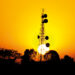 Sun sets behind African telecoms tower, tariff | Telcos BSS Revenue streams