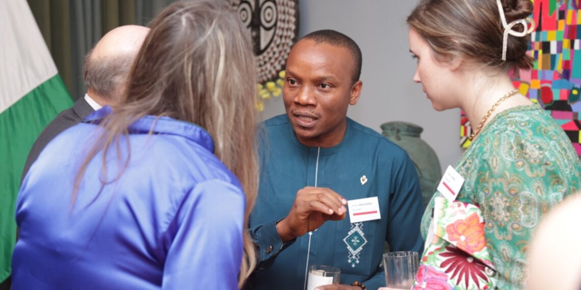 James Ezechukwu, Co-founder of SquirrelPR, engages some of the delegation from the US embassy in Abidjan
