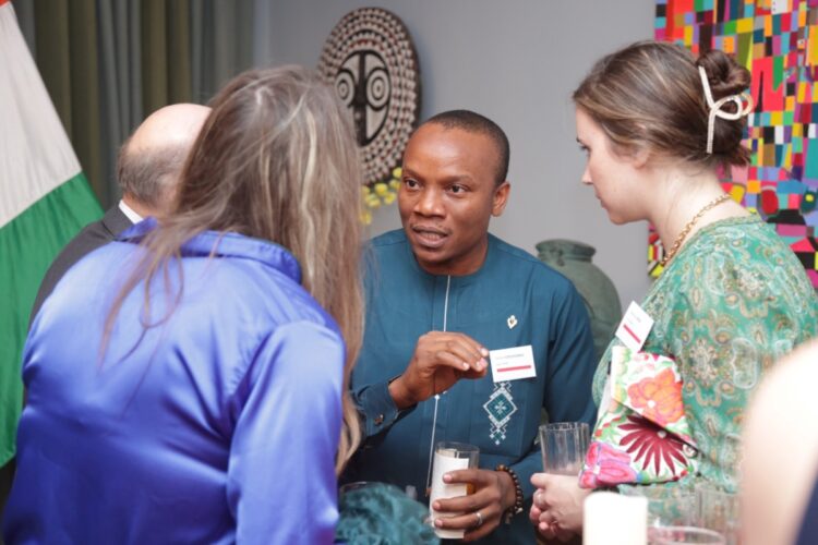 James Ezechukwu, Co-founder of SquirrelPR, engages some of the delegation from the US embassy in Abidjan