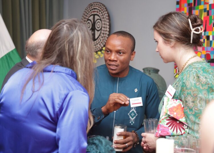 James Ezechukwu, Co-founder of SquirrelPR, engages some of the delegation from the US embassy in Abidjan