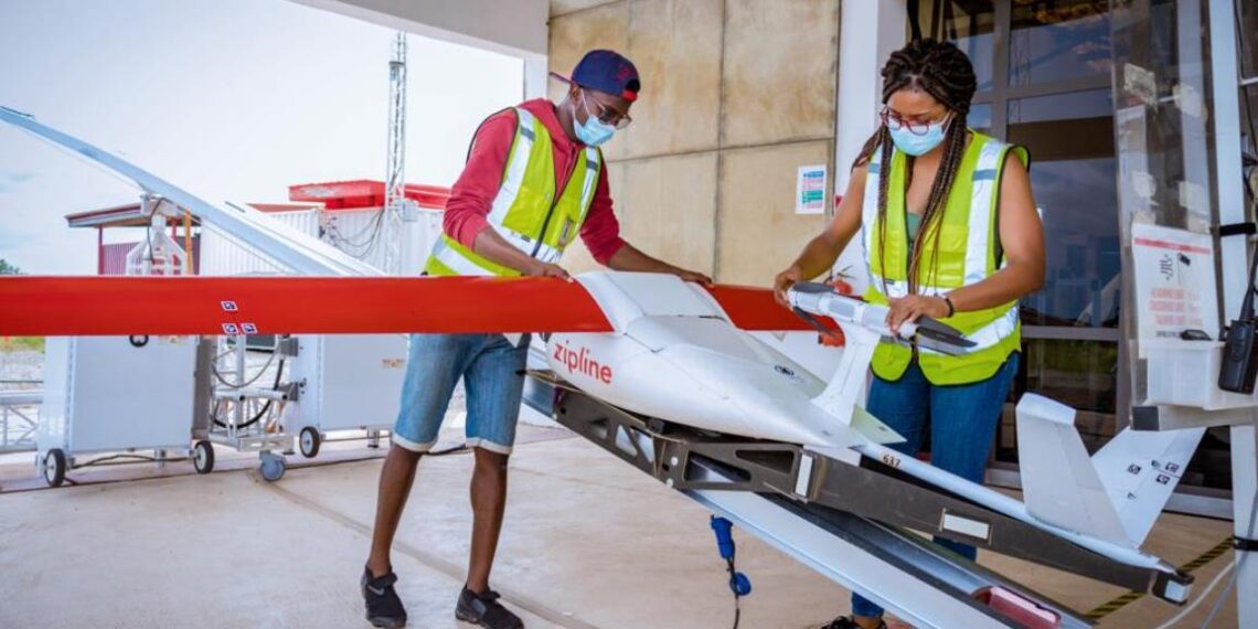 Zipline team preparing parcel for delivery