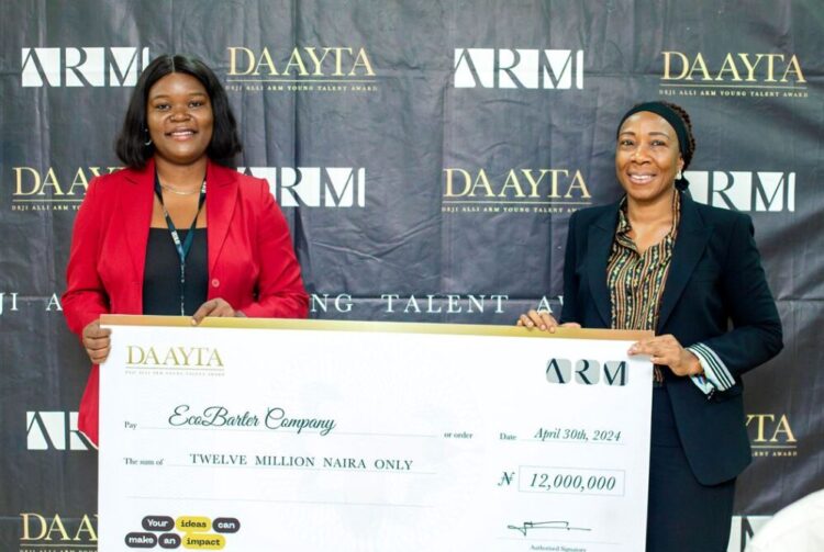 The winner of DAAYTA 2024, Rita Idehai of EcoBarter with Jumoke Ogundare, CEO of ARM