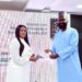 Linda Ochugbua receiving the 50MVPs award