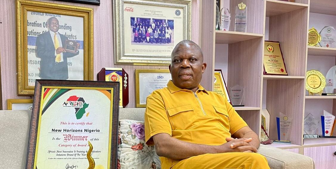 Tim Akano, the managing director, New Horizons Nigeria showcases the award