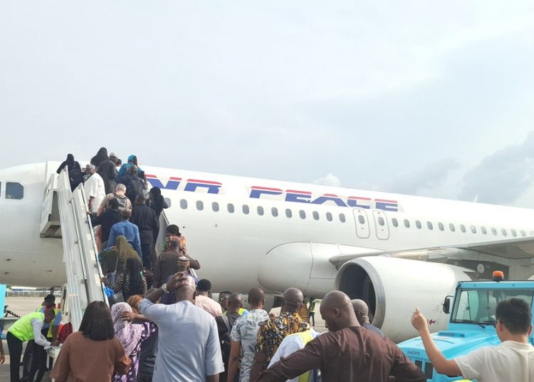 air passenger airlines traffic Lagos airport MMIA MM2 MM1 Air Peace