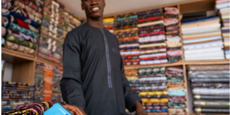 A Kano trader using Moniepoint