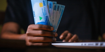 counting naira new notes - capital inflows | Nigeria and European Tech Giant