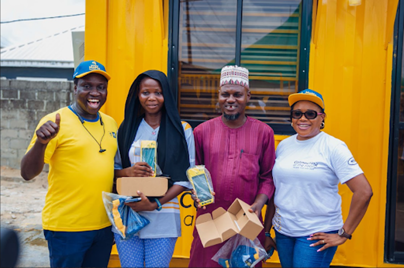MoMo Team Leads Financial Inclusion Drive at Y’ello Box Handover